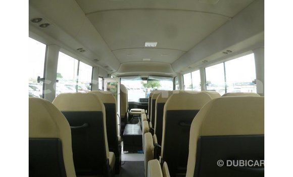 Acheter Import Voiture Toyota Coaster Blanc à Import - Dubai, Barh el Gazel Acheter Import Voiture Toyota Coaster Blanc à Import - Dubai, Barh el Gazel