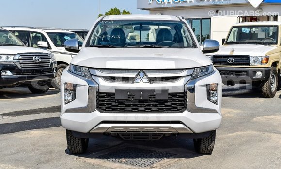 Buy Import Mitsubishi L200 White Car in Import - Dubai in Barh el Gazel Buy Import Mitsubishi L200 White Car in Import - Dubai in Barh el Gazel