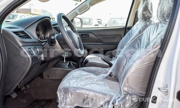 Buy Import Mitsubishi L200 White Car in Import - Dubai in Barh el Gazel Buy Import Mitsubishi L200 White Car in Import - Dubai in Barh el Gazel