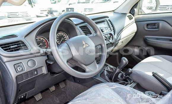 Buy Import Mitsubishi L200 White Car in Import - Dubai in Barh el Gazel Buy Import Mitsubishi L200 White Car in Import - Dubai in Barh el Gazel