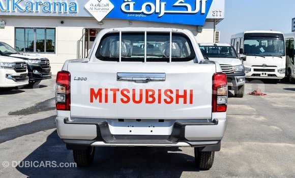 Buy Import Mitsubishi L200 White Car in Import - Dubai in Barh el Gazel Buy Import Mitsubishi L200 White Car in Import - Dubai in Barh el Gazel