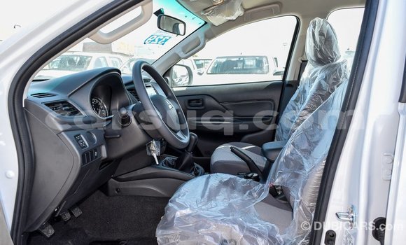 Buy Import Mitsubishi L200 White Car in Import - Dubai in Barh el Gazel Buy Import Mitsubishi L200 White Car in Import - Dubai in Barh el Gazel