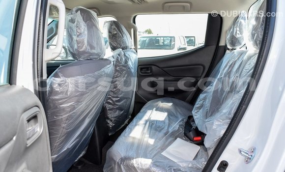 Buy Import Mitsubishi L200 White Car in Import - Dubai in Barh el Gazel Buy Import Mitsubishi L200 White Car in Import - Dubai in Barh el Gazel