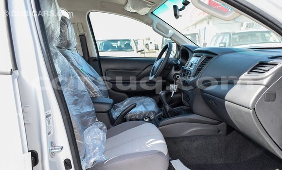 Buy Import Mitsubishi L200 White Car in Import - Dubai in Barh el Gazel Buy Import Mitsubishi L200 White Car in Import - Dubai in Barh el Gazel