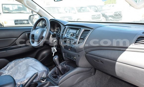 Buy Import Mitsubishi L200 White Car in Import - Dubai in Barh el Gazel Buy Import Mitsubishi L200 White Car in Import - Dubai in Barh el Gazel