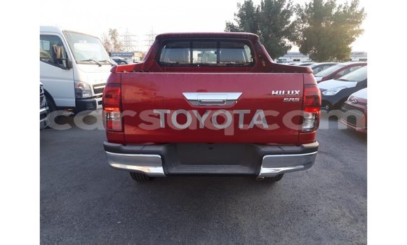 Acheter Import Voiture Toyota Hilux Rouge à Import - Dubai, Barh el Gazel Acheter Import Voiture Toyota Hilux Rouge à Import - Dubai, Barh el Gazel
