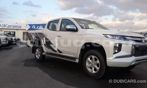 Buy Import Mitsubishi L200 White Car in Import - Dubai in Barh el Gazel Buy Import Mitsubishi L200 White Car in Import - Dubai in Barh el Gazel