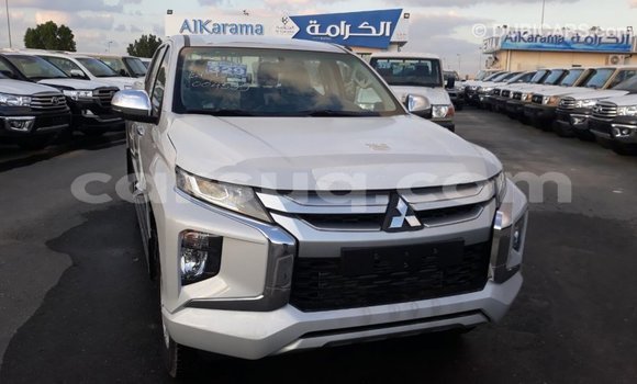 Buy Import Mitsubishi L200 White Car in Import - Dubai in Barh el Gazel Buy Import Mitsubishi L200 White Car in Import - Dubai in Barh el Gazel