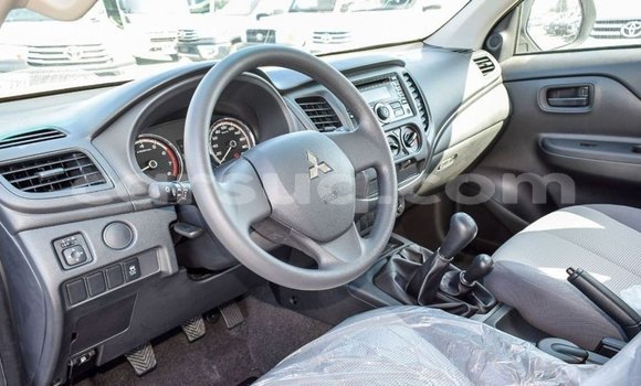 Buy Import Mitsubishi L200 White Car in Import - Dubai in Barh el Gazel Buy Import Mitsubishi L200 White Car in Import - Dubai in Barh el Gazel