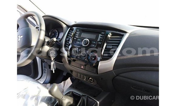 Buy Import Mitsubishi L200 White Car in Import - Dubai in Barh el Gazel Buy Import Mitsubishi L200 White Car in Import - Dubai in Barh el Gazel