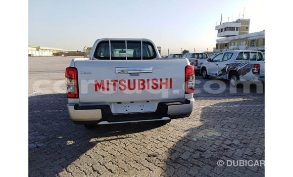 Buy Import Mitsubishi L200 White Car in Import - Dubai in Barh el Gazel Buy Import Mitsubishi L200 White Car in Import - Dubai in Barh el Gazel