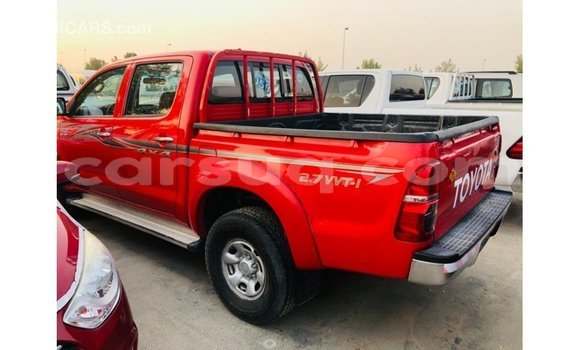 Buy Import Toyota Hilux Red Car in Import - Dubai in Barh el Gazel Buy Import Toyota Hilux Red Car in Import - Dubai in Barh el Gazel