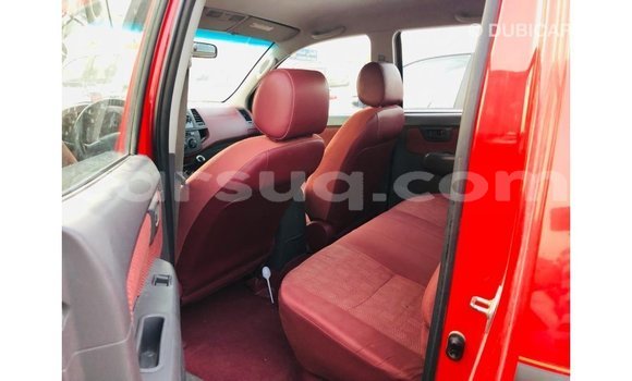 Buy Import Toyota Hilux Red Car in Import - Dubai in Barh el Gazel Buy Import Toyota Hilux Red Car in Import - Dubai in Barh el Gazel