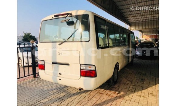 Acheter Import Voiture Toyota Coaster Blanc à Import - Dubai, Barh el Gazel Acheter Import Voiture Toyota Coaster Blanc à Import - Dubai, Barh el Gazel