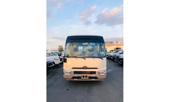 Acheter Import Voiture Toyota Coaster Blanc à Import - Dubai, Barh el Gazel